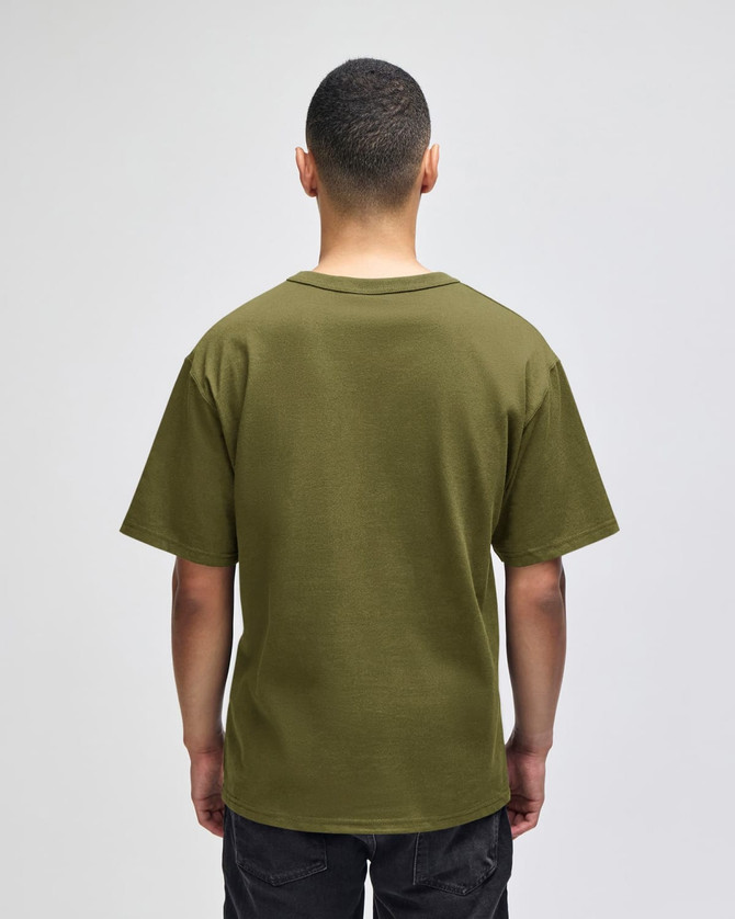 A green Champion Adult Heritage Jersey T-Shirt from the back, featuring short sleeves and a relaxed fit.
