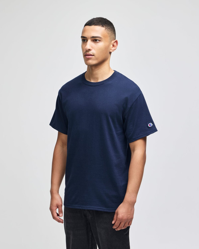 A navy short-sleeve T-shirt with a logo on the sleeve, featuring a classic fit and simple design.