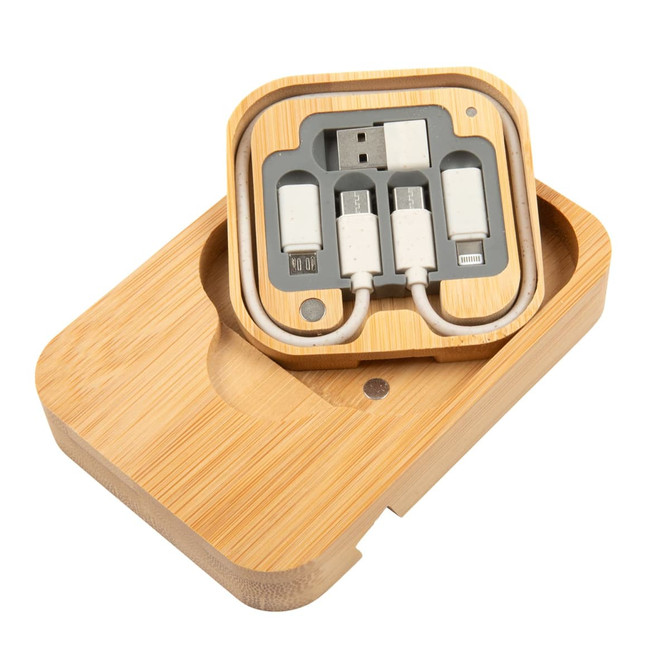 A bamboo product holder containing an eco-friendly charger set with various connection types.