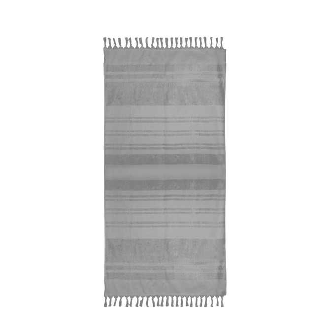 A grey flat terry towel with striped pattern and tassels along the edges. It features a logo.