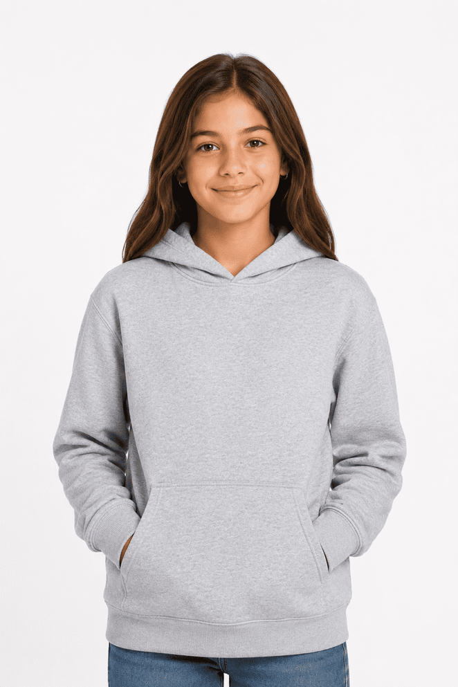 A grey hoodie for kids with a front pocket and a large hood. The garment has a plain design and features branding.