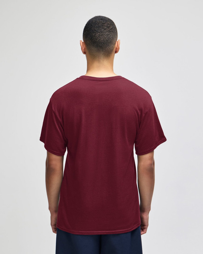 A maroon Champion Adult Jersey Short Sleeve T-Shirt viewed from the back, featuring a logo.