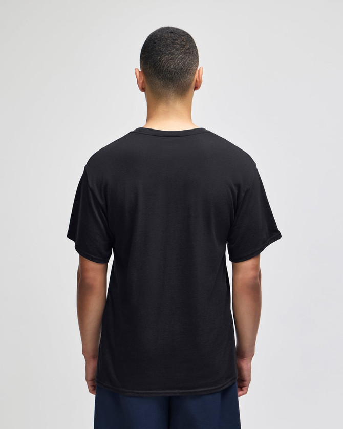 A black Champion adult jersey short sleeve t-shirt viewed from the back. The model is standing against a plain background.