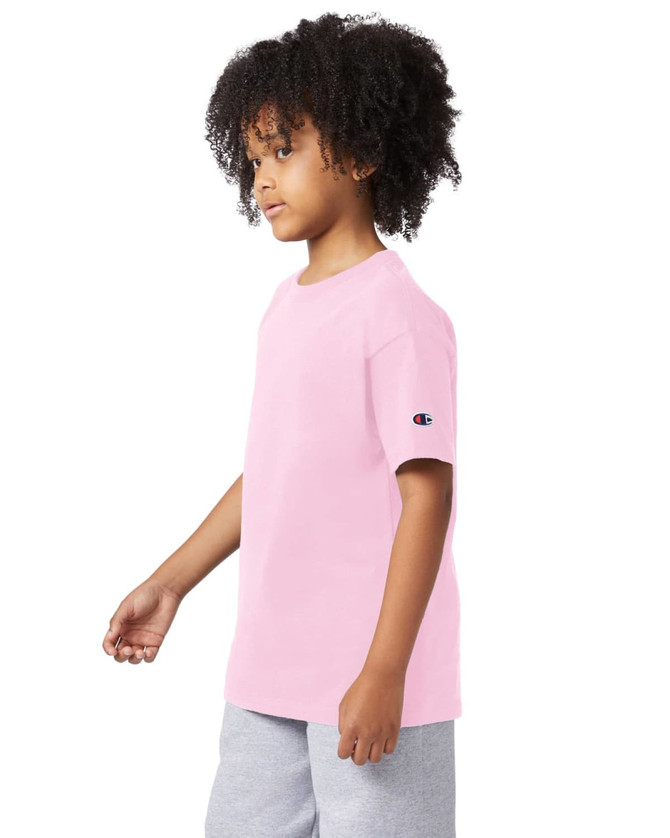 A pink short sleeve t-shirt for youth features a logo on the sleeve, displayed on a model.