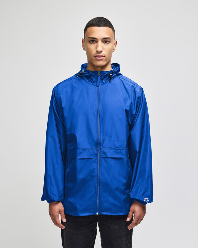 A blue full-zip anorak jacket with a hood, featuring a logo and a front pocket.