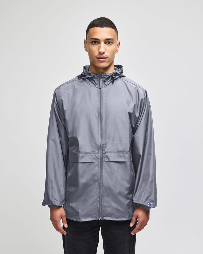 A grey full-zip anorak jacket with a hood and a logo, featuring a front pocket and relaxed fit.