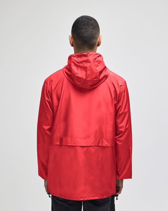 A red full-zip anorak jacket with a hood, featuring a back view and a logo. Suitable for rainy weather.