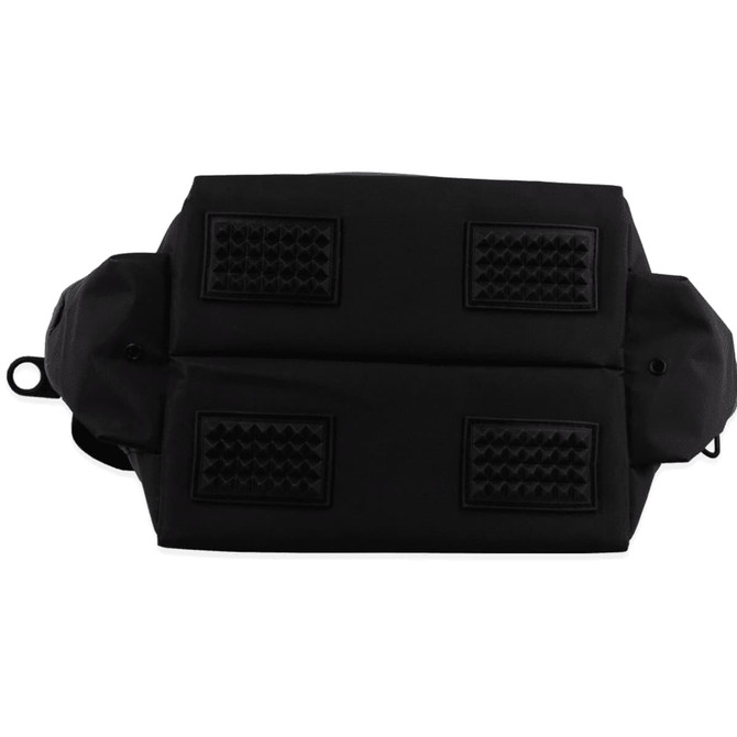 A black cooler bag with textured underside and two compartments, featuring a logo. Suitable for carrying beverages.