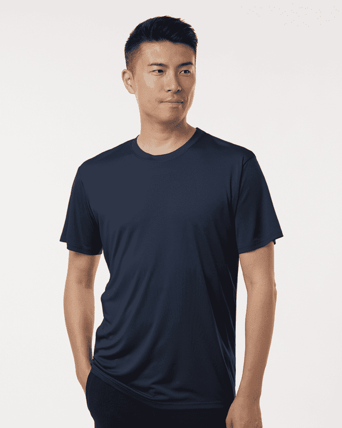 A navy blue men's performance T-shirt featuring a logo, designed for comfort and style.
