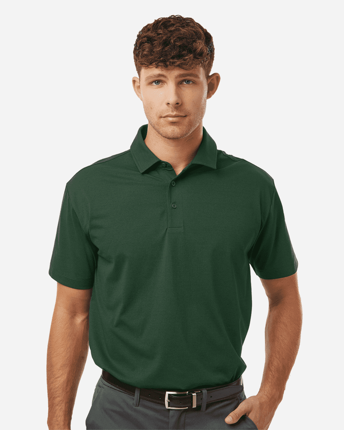 A green polo shirt with a collar and short sleeves, featuring a logo on the chest.