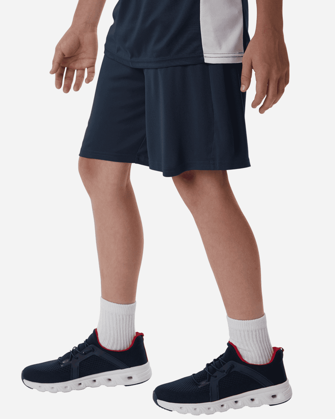 Men's Pro-Lock Performance Short in navy, featuring a relaxed fit and an elastic waistband, paired with sporty footwear.