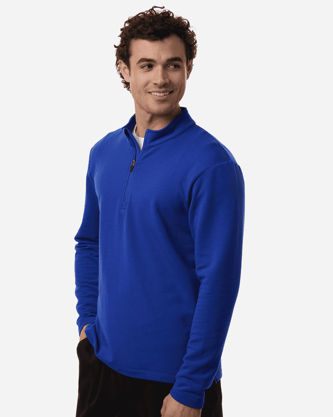 Men's stretch fleece 1/4 zip in bright blue, featuring a zippered neckline and long sleeves, with a logo present.