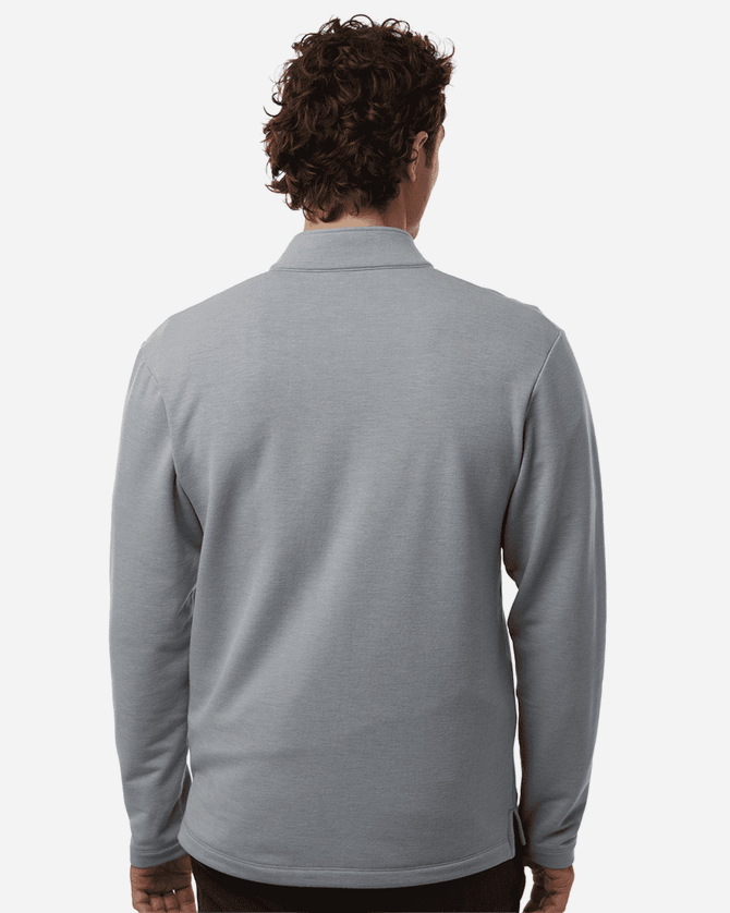 A men's stretch fleece 1/4 zip in grey, featuring a back view with long sleeves and a collar. It has a logo.