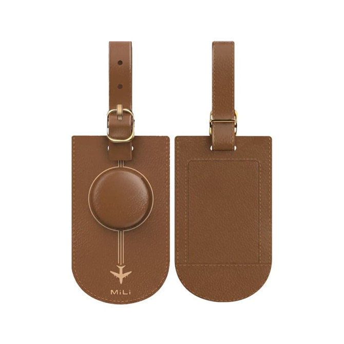 A brown leather luggage tag with a circular attachment and a strap, featuring a logo.