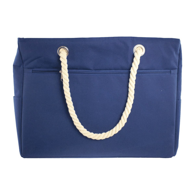 A navy waterproof beach bag with cream rope handles and side pockets, featuring a simple design.