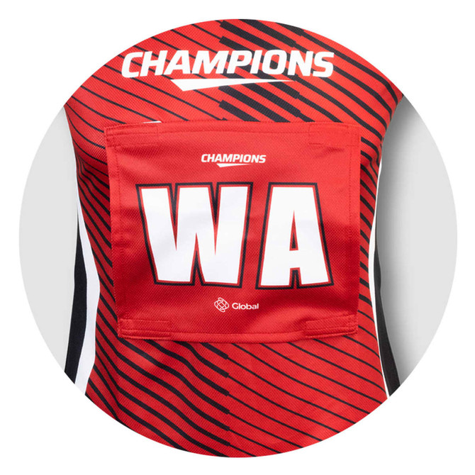 A red netball bib with black stripes, featuring a large white "WA" and a logo.