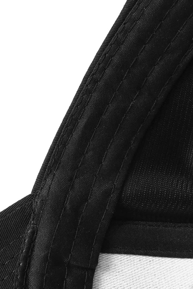 A close-up of a black, six-panel cap, highlighting the stitching and fabric texture. The cap includes a logo.