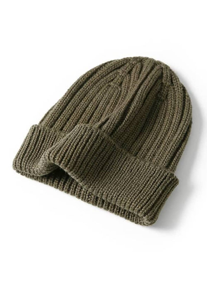 A green knitted beanie with a folded cuff, featuring a textured ribbed pattern.