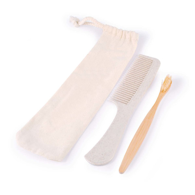 A toiletry travel pack featuring a bamboo toothbrush, a comb, and a drawstring pouch for storage.
