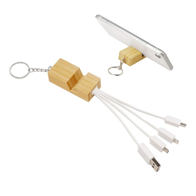 A bamboo phone stand with a key ring and multiple charging cables in white, designed for mobile devices.