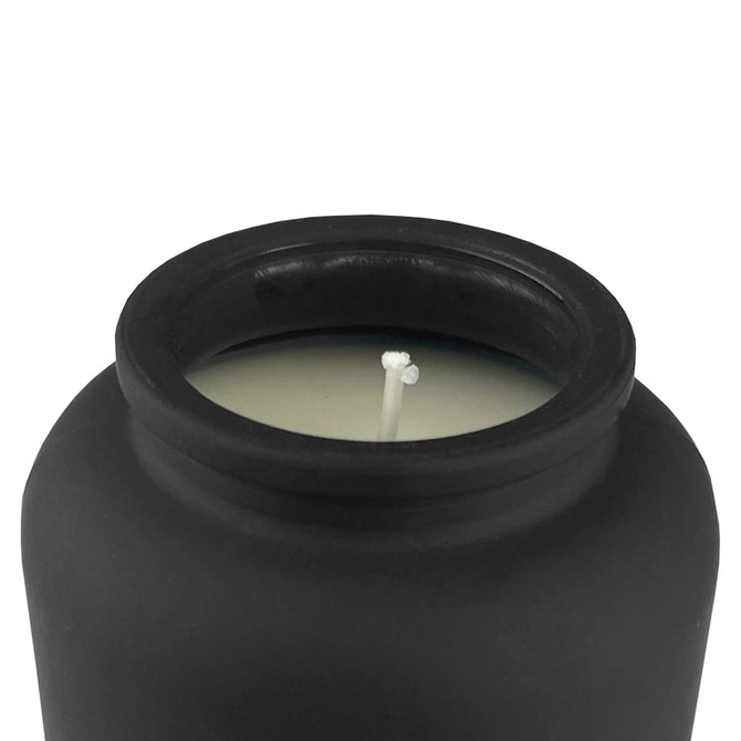 A black candle with a white wick, featuring a smooth matte finish on the container.