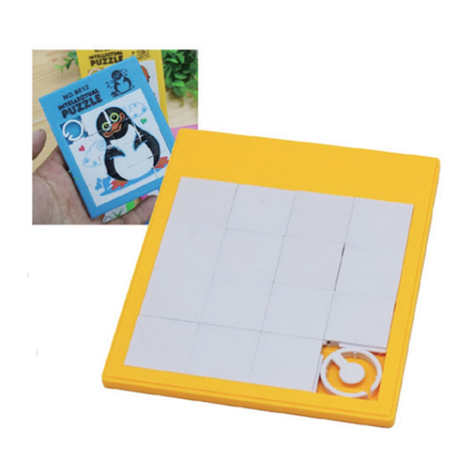 A yellow puzzle board with a missing piece, featuring a themed penguin design on the packaging.