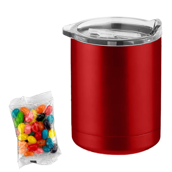 A red coffee mug with a clear lid beside a bag of colourful jelly beans. The mug has a branding logo.