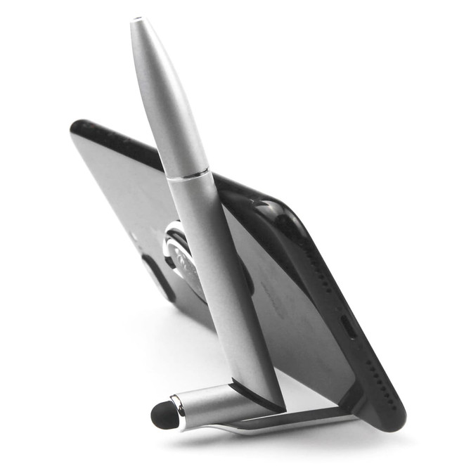 A silver stylus pen positioned as a stand for a smartphone, featuring a sleek metal design and a branding logo.