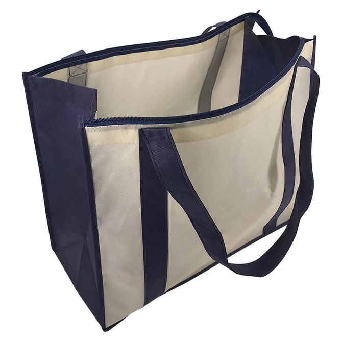 A large zipped shopping bag in navy and cream, featuring two sturdy handles and an internal zipped pocket.