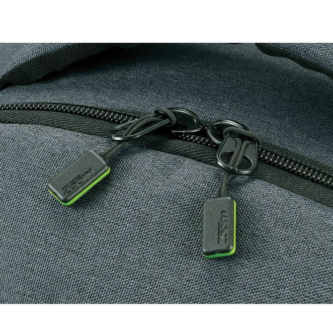 A grey backpack with a textured finish, featuring dual black zippers with green accents and a logo.