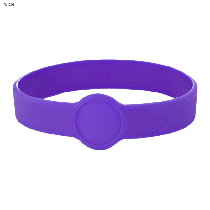 A purple silicone wristband featuring a circular design element and a logo.
