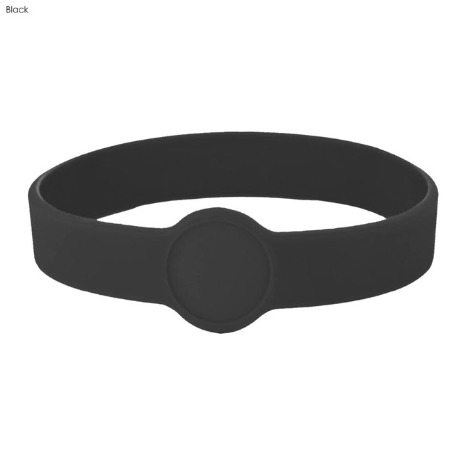 A black silicone wristband featuring a circular design element, suitable for custom branding.