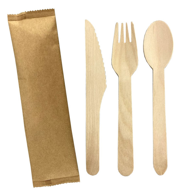 A wooden cutlery set featuring a knife, fork, and spoon, alongside a kraft paper wrapper.