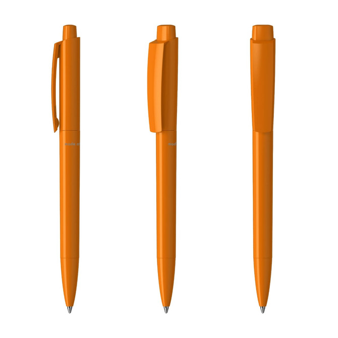 Three orange plastic pens displayed from different angles, each featuring a clip and a smooth barrel design.