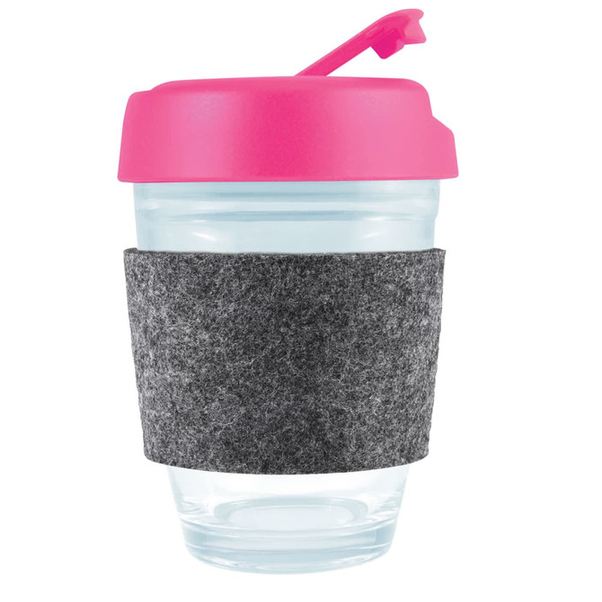 A reusable coffee cup featuring a clear body, a vibrant pink flip lid, and a gray RPET band for grip.