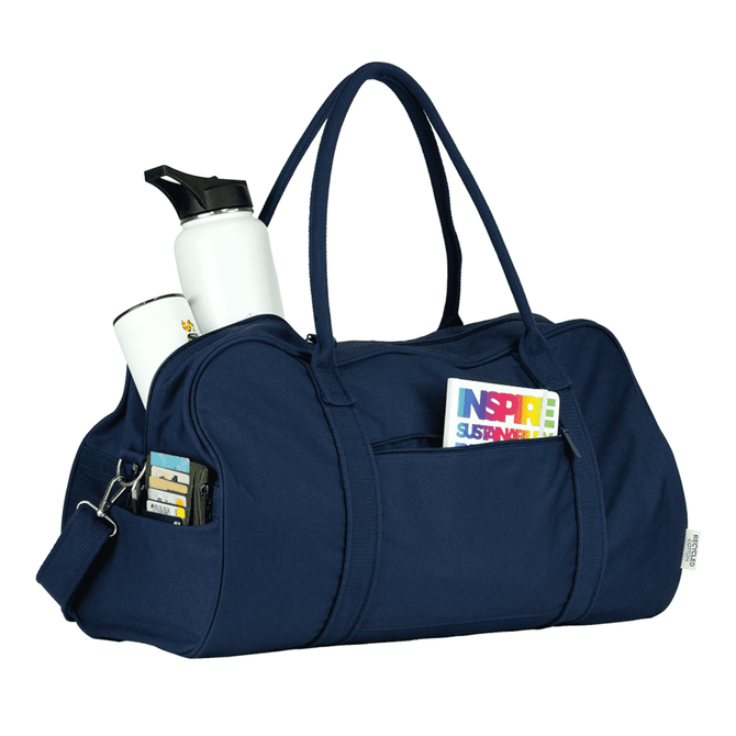 A navy duffel bag with multiple pockets, featuring a drink bottle and various items stored inside.