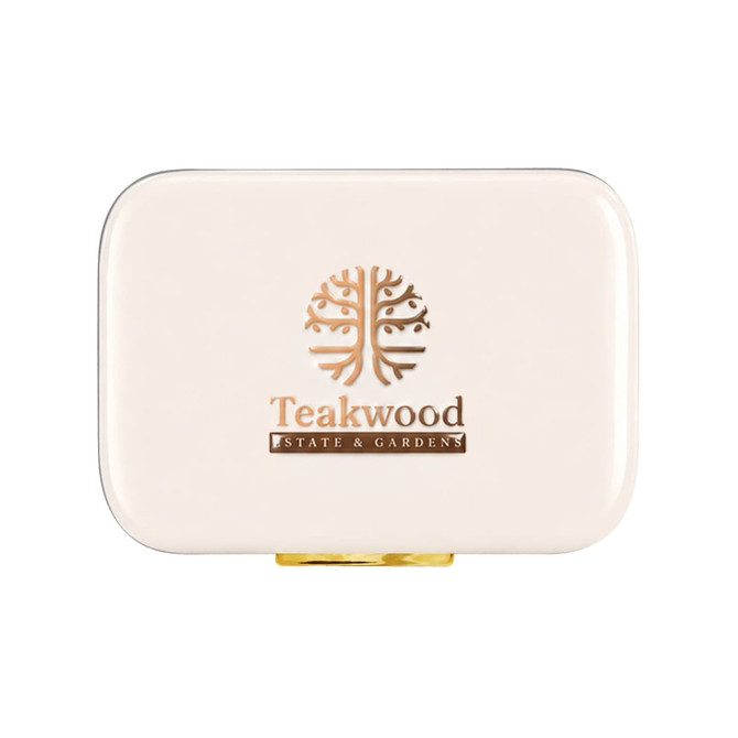 A cream-coloured cooler bag with a tree logo and gold detailing, designed for outdoor use.