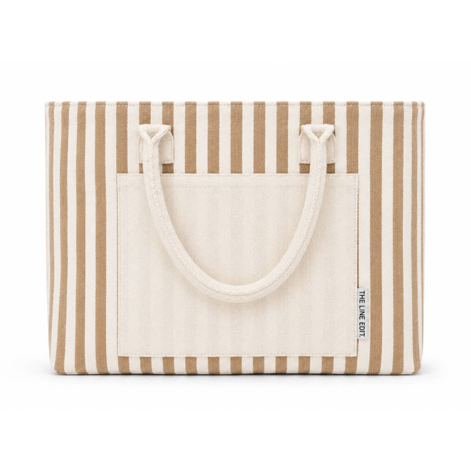 A striped tote bag with a cream and brown pattern, featuring two handles and a front pocket.
