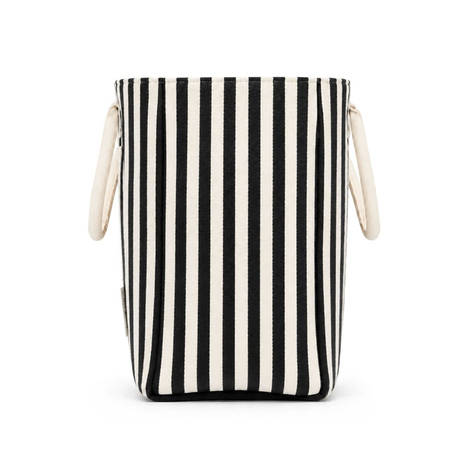 A striped tote bag in black and cream with two handles and a logo on the side.