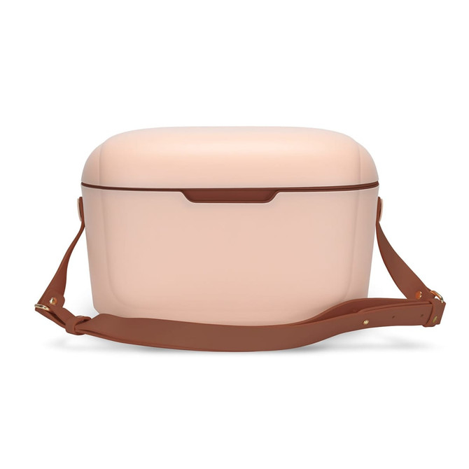 A drink cooler in a soft pink colour with a brown strap, featuring a smooth, rounded design.