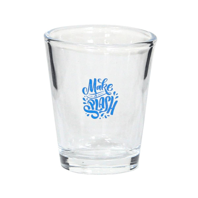 A clear shot glass featuring a blue logo design. Ideal for serving spirits or as a decorative piece.