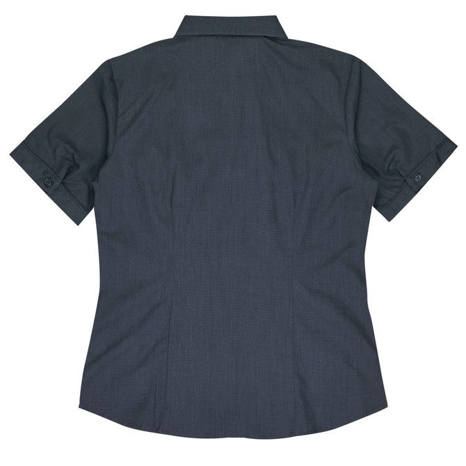A short-sleeve, button-up women's shirt in a dark grey colour with a back view and rolled sleeves. It has a logo.