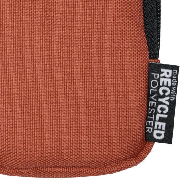 A small pouch in earthy orange, made from recycled polyester, featuring a black zip and branding label.