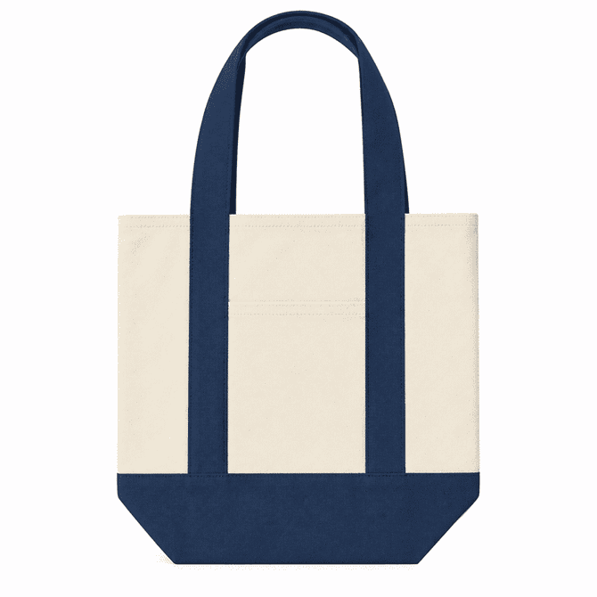 A mini canvas tote in cream and navy blue, featuring two handles and a small pocket on the front.