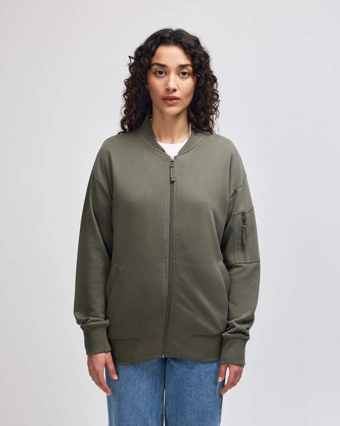 A unisex bomber jacket in olive green featuring a zip front and a side pocket. It has a branding logo.