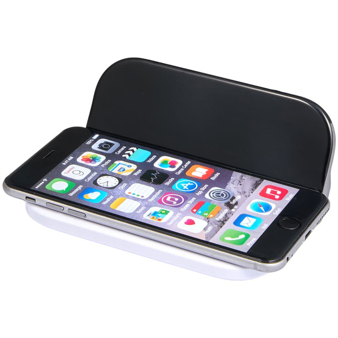 A black and white wireless charger featuring a slot for holding a smartphone while charging.