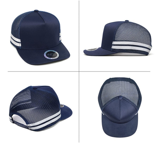 A navy blue trucker cap with mesh sides and a logo. Features two white stripes on the front panel.