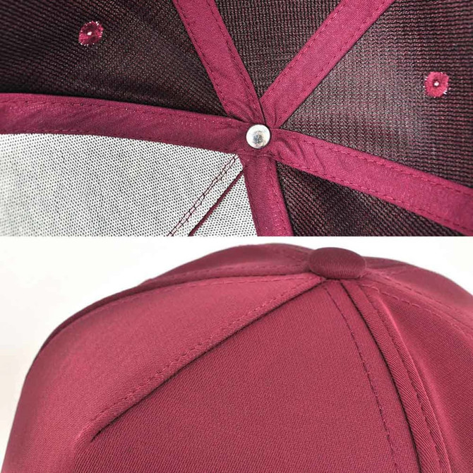 A burgundy D-Lux 5 Panel Cap featuring a mesh interior and a circular top button, complete with branding.