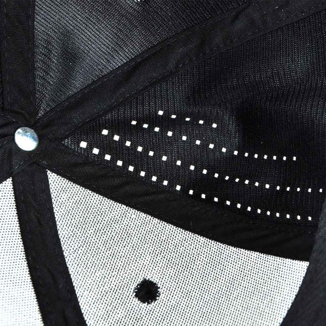 A black cap with a mesh interior and a small logo, featuring ventilation holes for breathability.