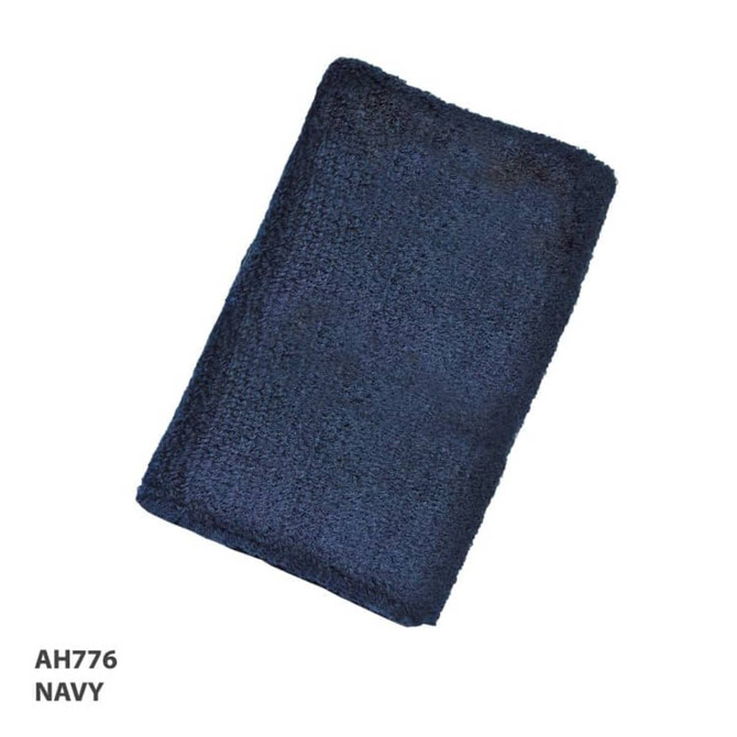 A navy blue towel with a textured surface, featuring a logo.